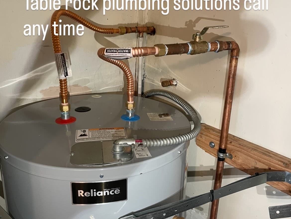 Water heater and copper connections photographed by Table Rock Plumbing Solutions